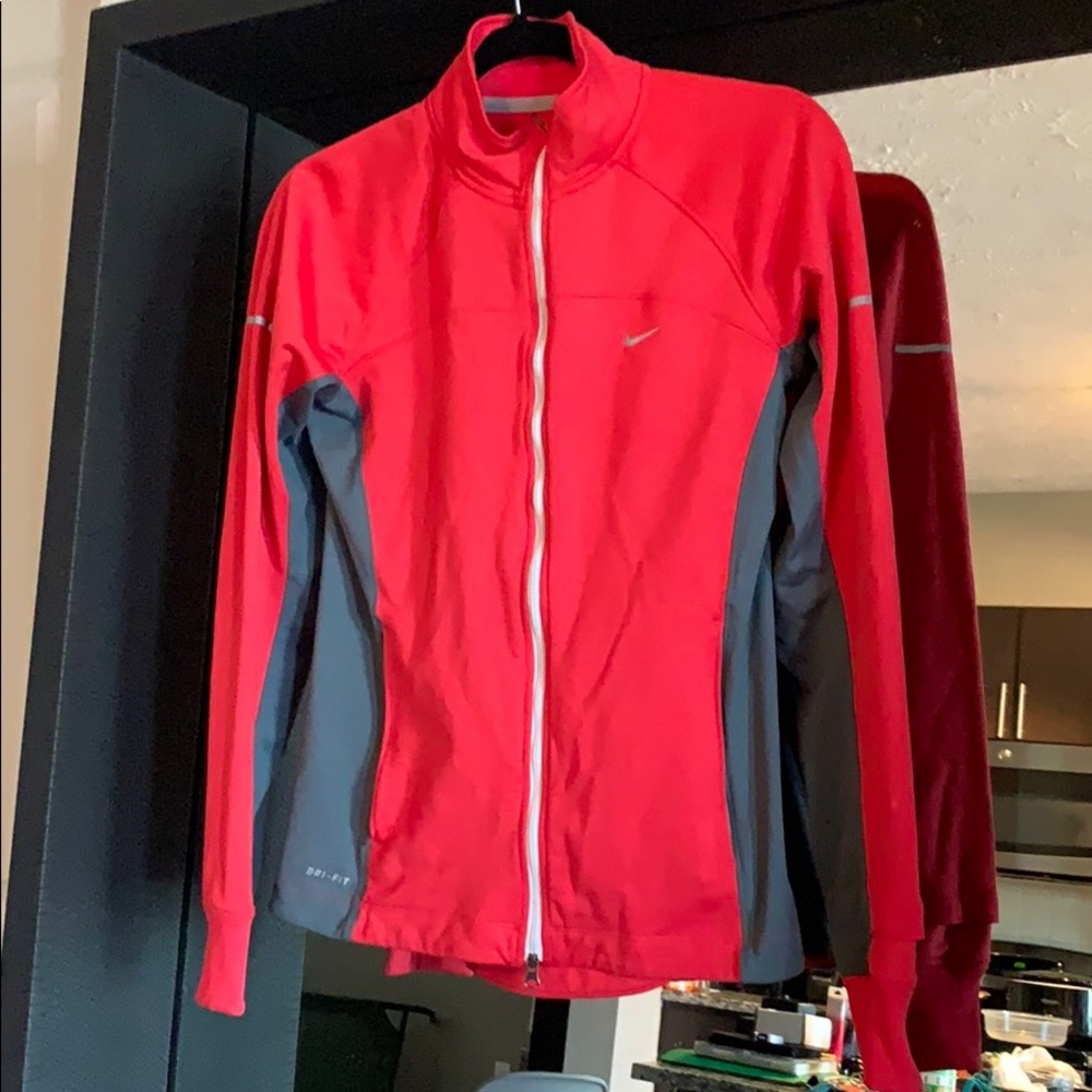 Nike women’s running jacket Size S
